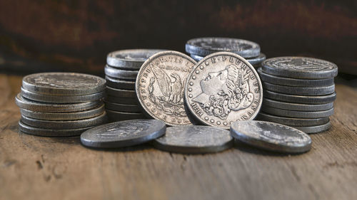 Close-up of coins on table