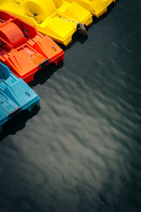 High angle view of yellow boat moored in lake