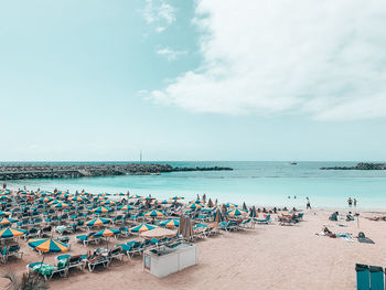 Scenic view of beach against sky