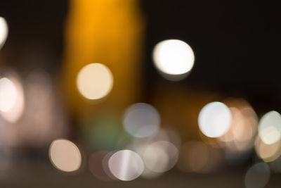 Defocused image of illuminated lights at night