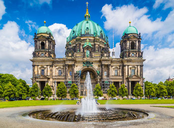 View of fountain against building