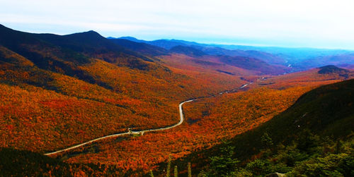 Scenic view of landscape against sky during autumn