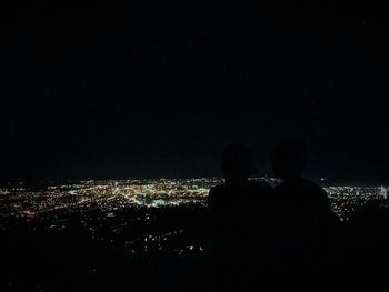 Illuminated cityscape at night