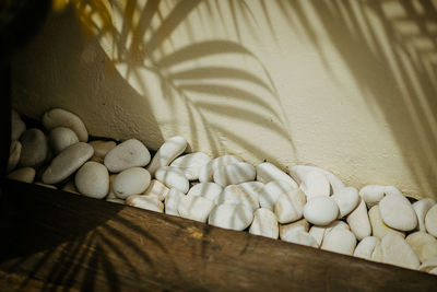 White stones and palm silhouette 