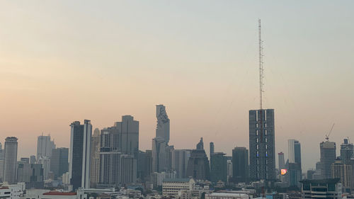 View of buildings against sky during sunset