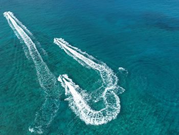 High angle view of wake in sea