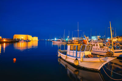 Venetian fort in heraklion and moored fishing boats, crete island, greece