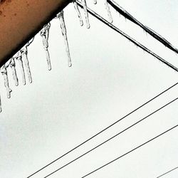 Low angle view of electricity pylon