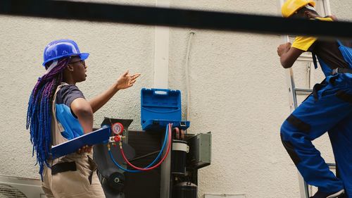 Side view of man working at construction site