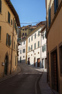 Street amidst buildings in city