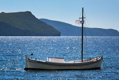 Traditional greek fishing boat in the aegean sea, greece.