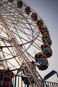 Closeup of multi-coloured giant wheel during dussehra mela in delhi, india. bottom view giant wheel