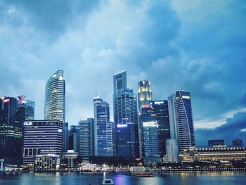 Low angle view of skyscrapers lit up at night