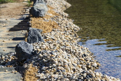 High angle view of stones on beach