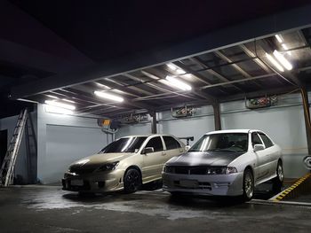 Car in illuminated building