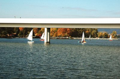 Bridge over sea against sky