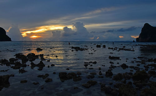 Scenic view of sea at sunset