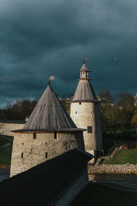 Tower amidst buildings against sky