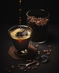 Close-up of coffee served on table