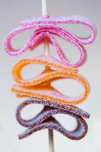 Close-up of candies against white background