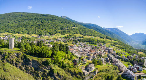 High angle view of trees and buildings against sky