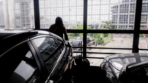 Woman looking at city skyline