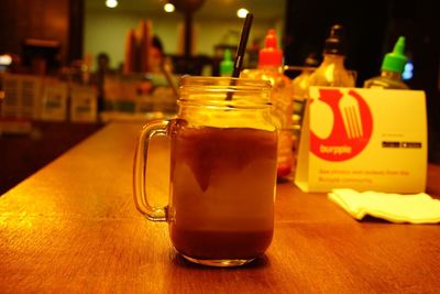 Close-up of beer glass on table