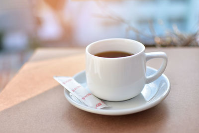 High angle view of coffee cup on table