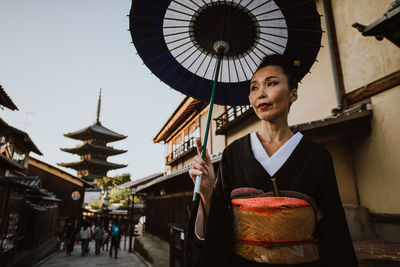 Woman holding umbrella