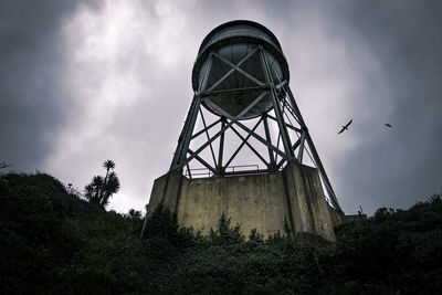 Low angle view of old tower against sky