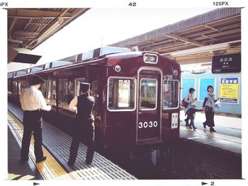 People at railroad station