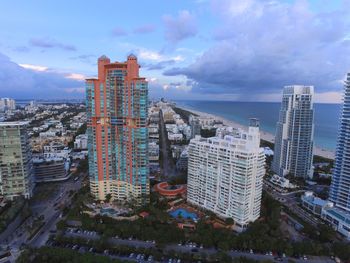 High angle view of buildings in city against sky