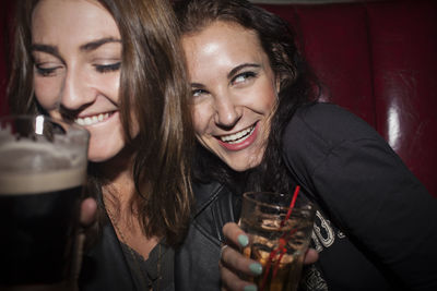 Friends drinking at a nightclub