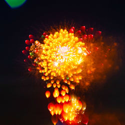 Close-up of illuminated red lights at night