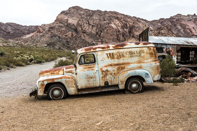 Vintage car against mountain