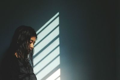 Woman looking at shadow