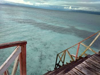 High angle view of pier over sea against sky