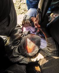 Midsection of men with man