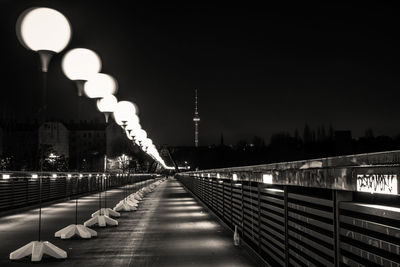 Illuminated street lights at night