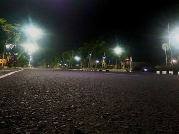 View of illuminated street at night