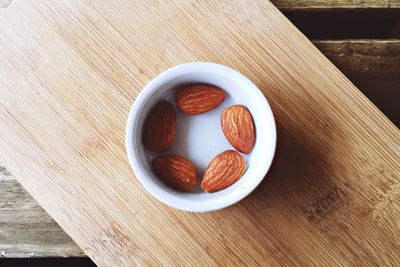 Close-up high angle view of almonds on table