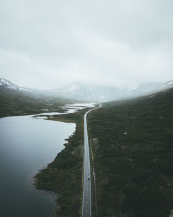 Scenic view of mountain road against sky