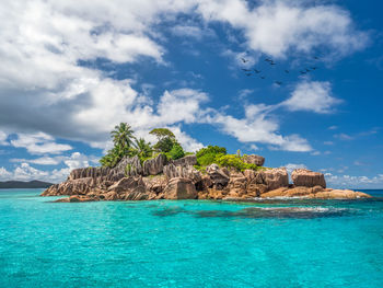 Scenic view of an island against sky