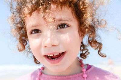 Close-up portrait of a smiling girl