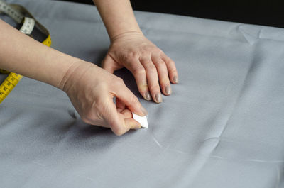High angle view of people on hands