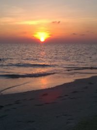 Scenic view of sea at sunset