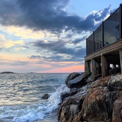 Scenic view of sea against cloudy sky