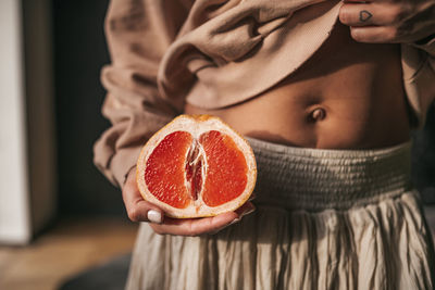 Close-up of woman holding ice cream