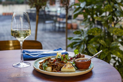 Wine glass on table in restaurant