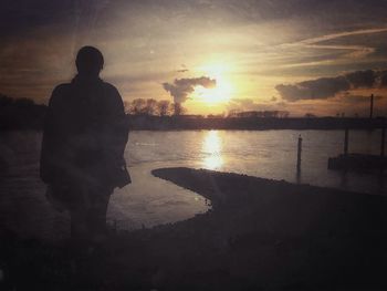 Scenic view of sea at sunset